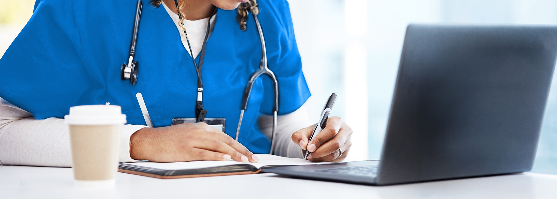 medical student studying at computer
